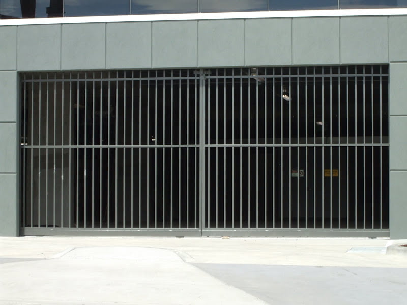 Twin automated electric sliding gates - steel