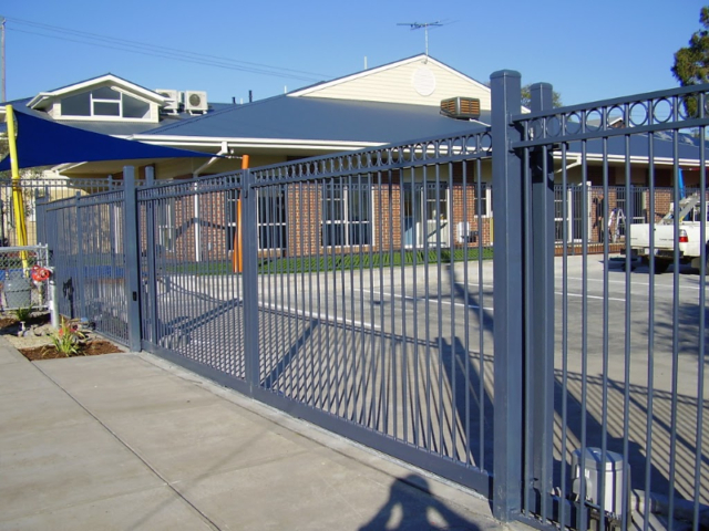 Twin automated electric sliding gates - steel